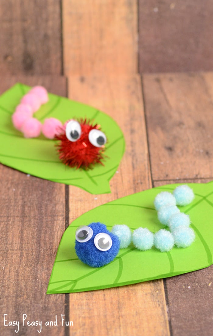 Spring arts and crafts idea of caterpillars made from pom poms.