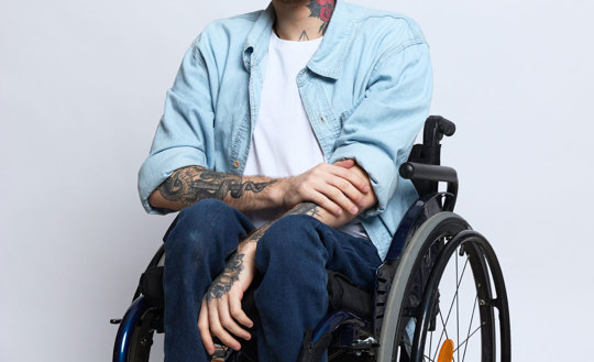 Image of a man in a wheelchair